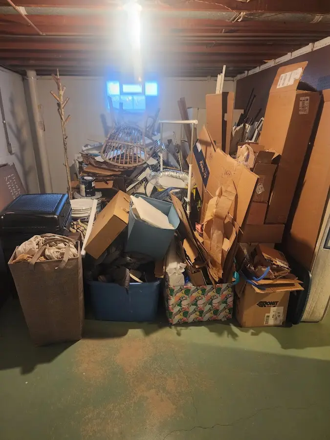 Roll-off dumpster container at job site for 15 Yard Dumpster Rental in Lyman